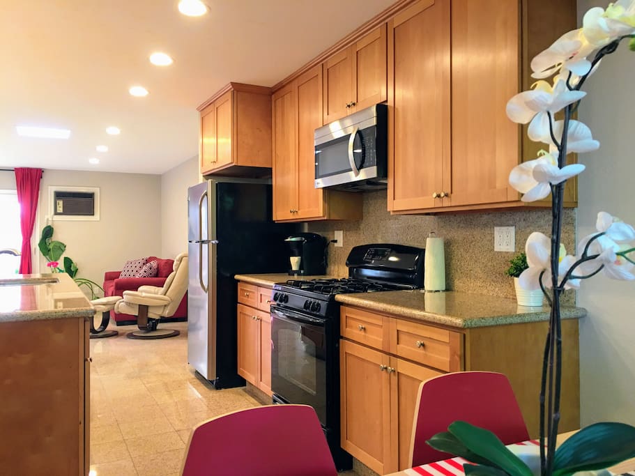 View of the kitchen and living room from the dining table
