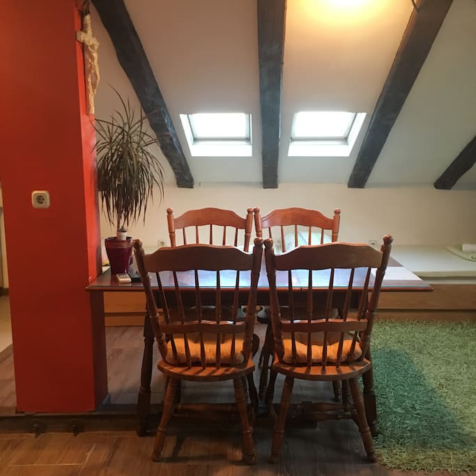 The table with the chairs