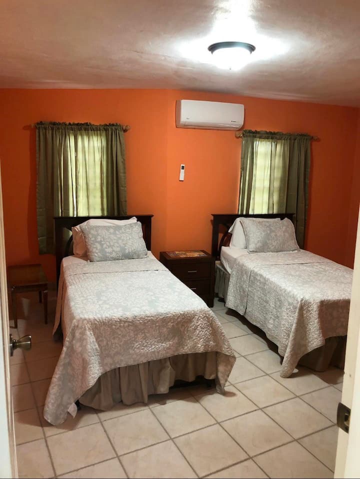 Second bedroom features two twin beds. Beds can be converted to a king size bed. 