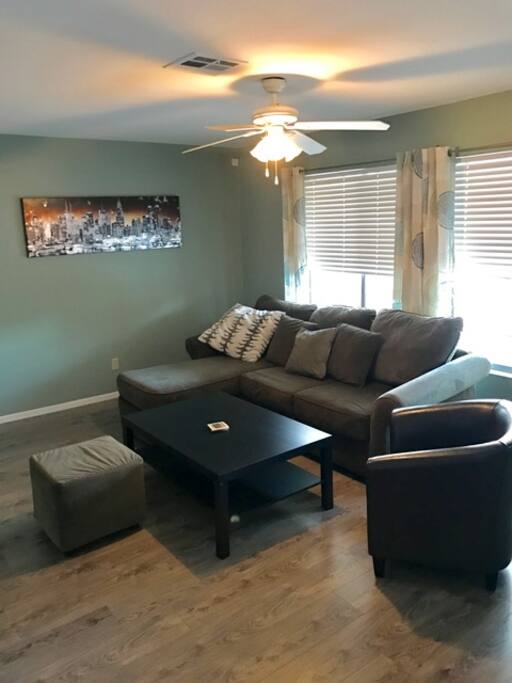 Living/TV room with expandable sofa for 2