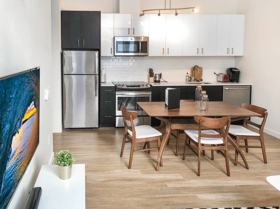 Our kitchen has a Keurig with coffee and tea, a toaster, and all the utensils you need to cook and enjoy a meal at home.