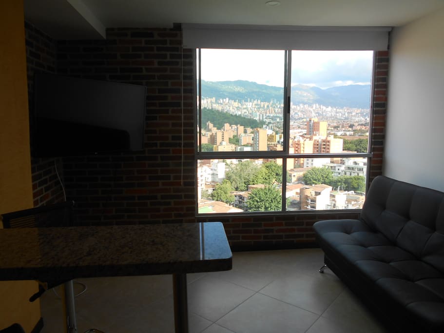 50" Smart TVs, sofa bed, kitchen bar and great views.
