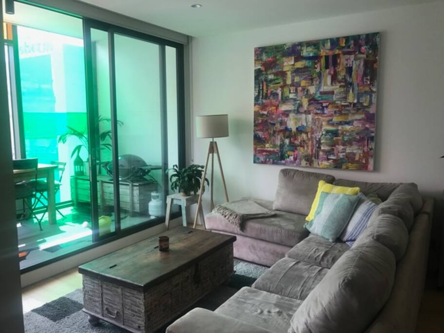 Living area opening on to enclosed balcony