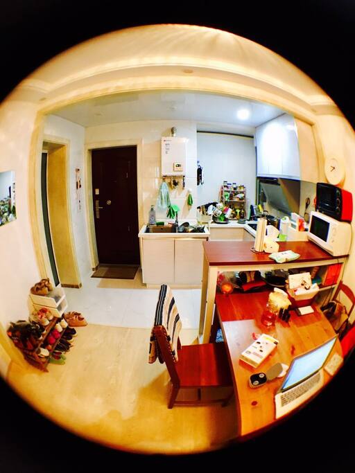 Share living room with communal table and kitchen
