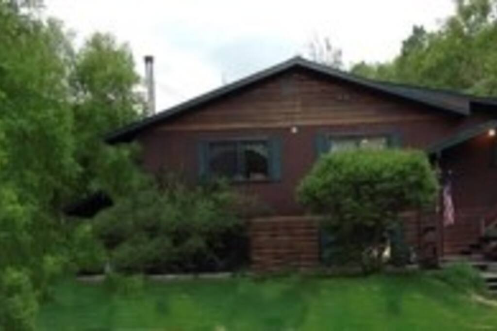 Over 1200 sq. ft. upstairs unit of duplex with open floor plan and huge windows overlooking beautiful lawns and gardens.
