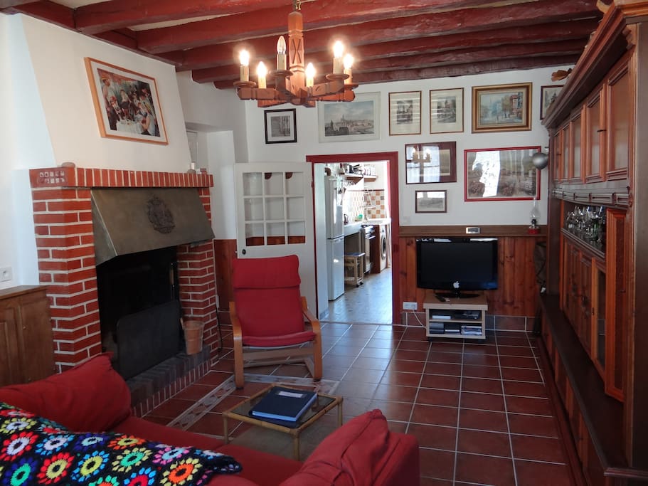 Warm comfortable living room with large cozy fireplace
