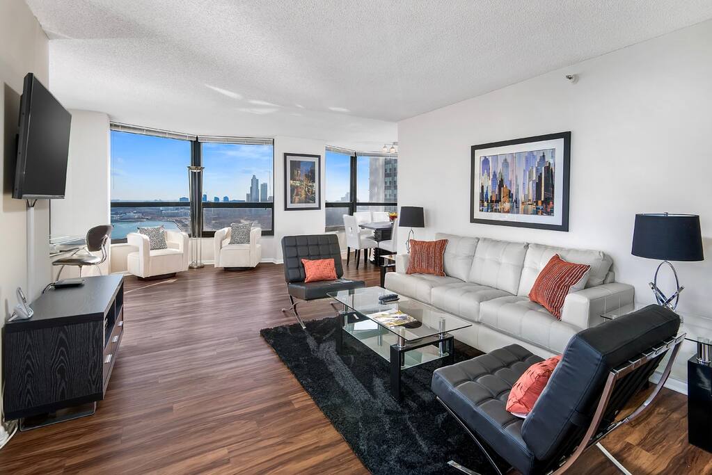 Clean and modern living room with ample seating