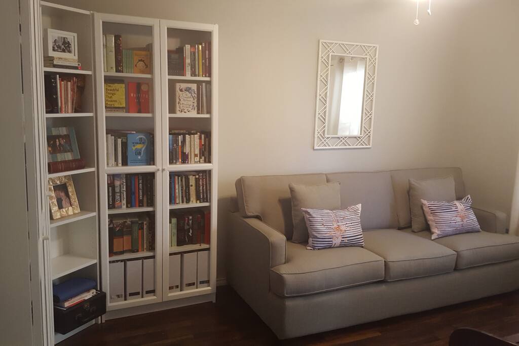 Guest bedroom / Study with access to private patio. Brand new (made in US) sofa bed has comfy queen-sized mattress. Private full 3-piece bathroom immediately next door to bedroom.