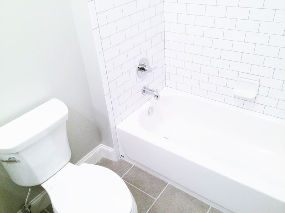 Luxe Bath with Subway Tile & European Fixtures!
