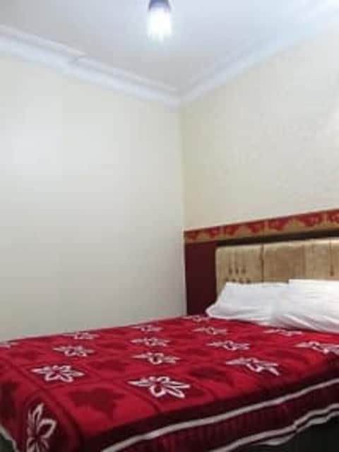 A single Private room , Shared Bathroom free WIFI.