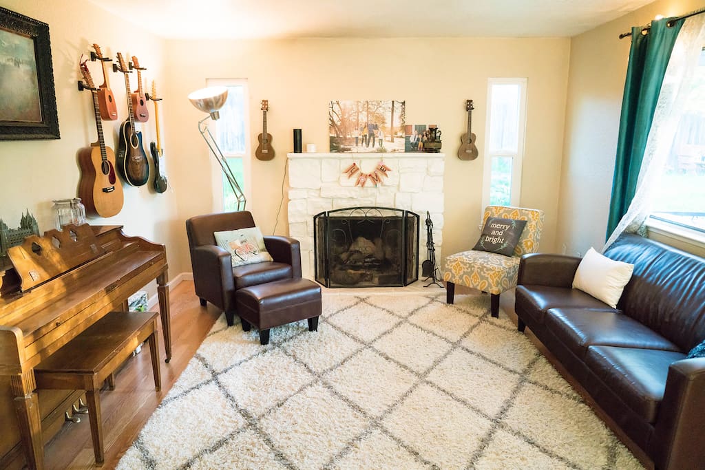 Living Room with Piano, Guitars & Ukuleles