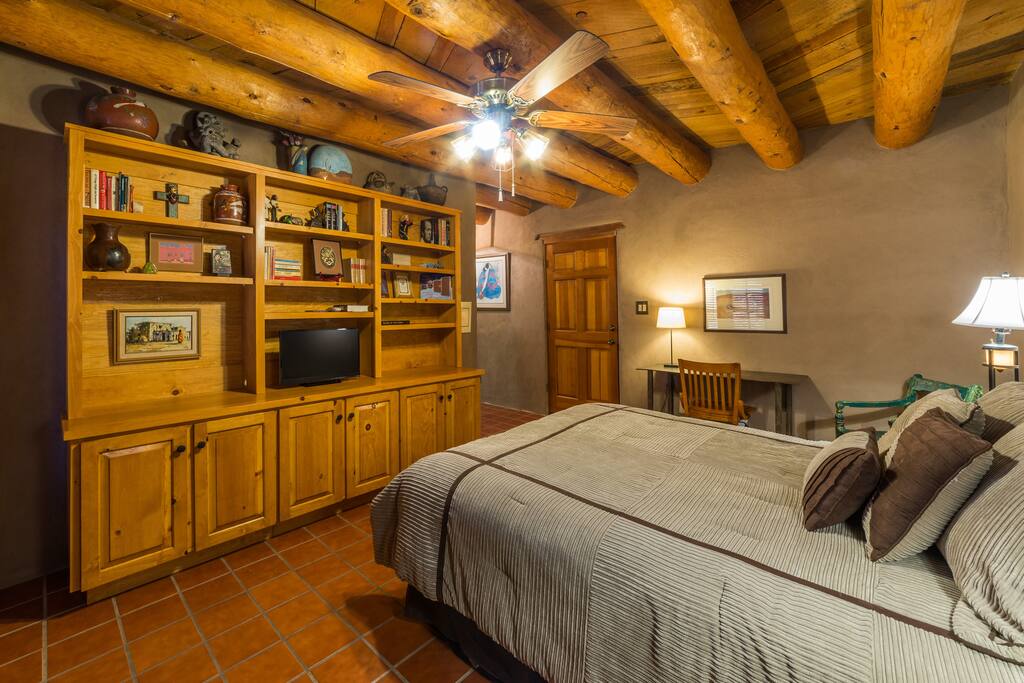 Books, Television, and cabinets with plenty of storage