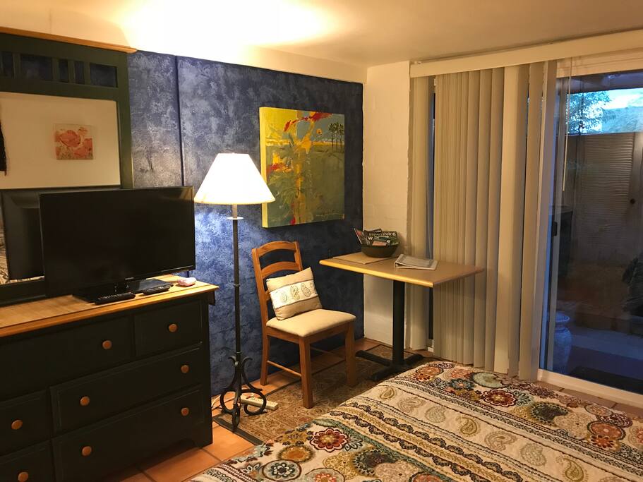Table and work chair, TV and dresser