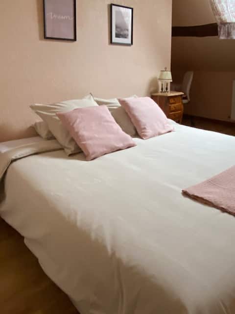 Welcoming bedroom in bed and breakfast house