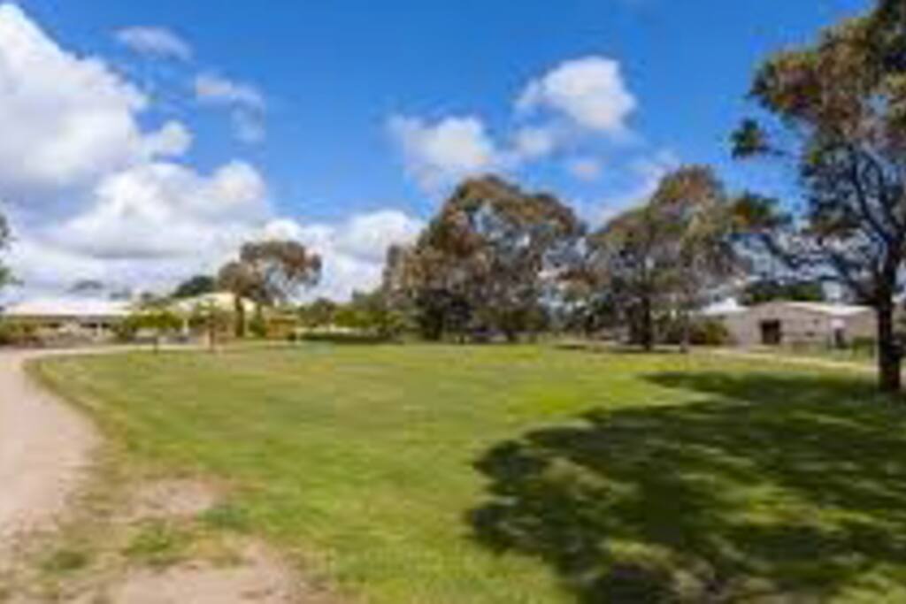 Entrance with house on left & stables on right