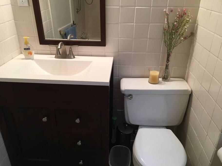 Bedroom is adjacent to upstairs bathroom in hallway