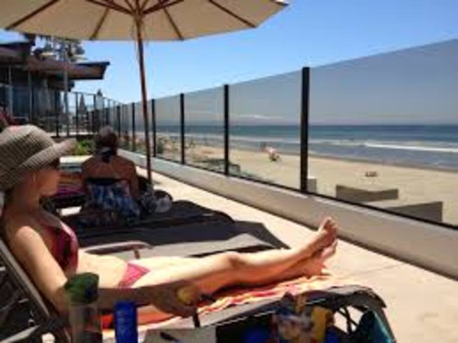 Pool downstairs overlooks the beach. Perfect place to read a book.