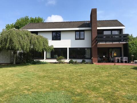 Charming architectural house with large garden