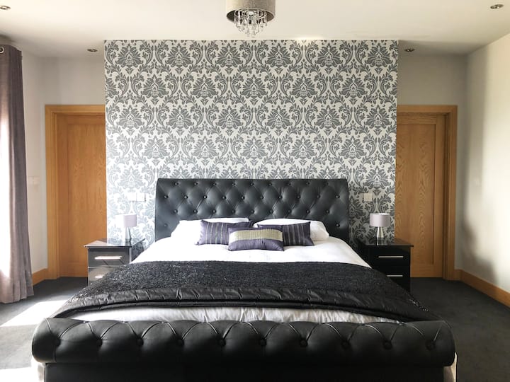 Master bedroom, superking bed with walk in closet and ensuite bathroom