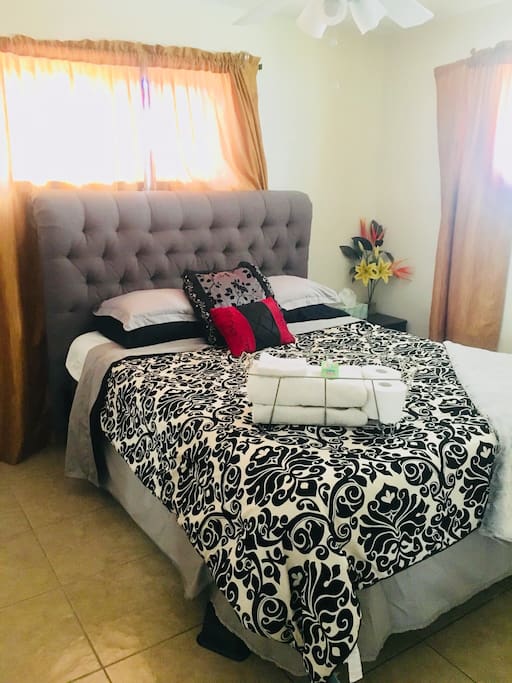 Bedroom option, queen size bed w/Tv, window over looks the pool and out door gym. Backyard has a 10ft privacy wall to ensure the utmost privacy