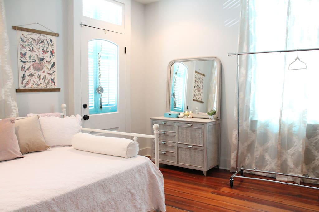 Shutters can be closed for privacy and opened for lots of light. Drawers contain art supplies that can be removed upon request.