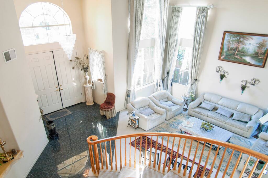 Entrance and hallway with 14 stairs leading up to your room.