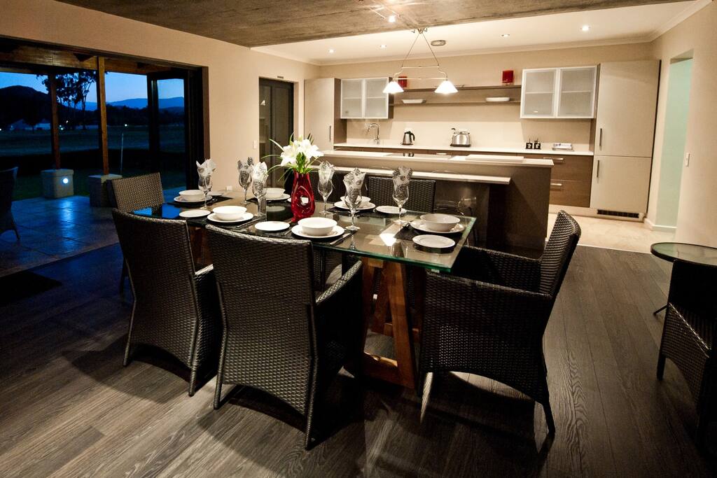 Open space living area for dining, socializing and relaxing at the fire place