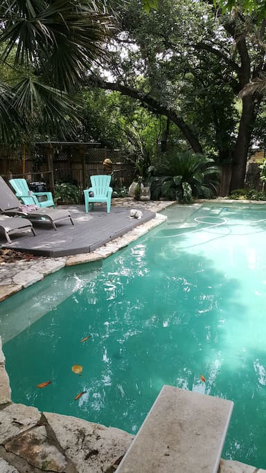 eight and a half foot deep pool with deck and hot tub