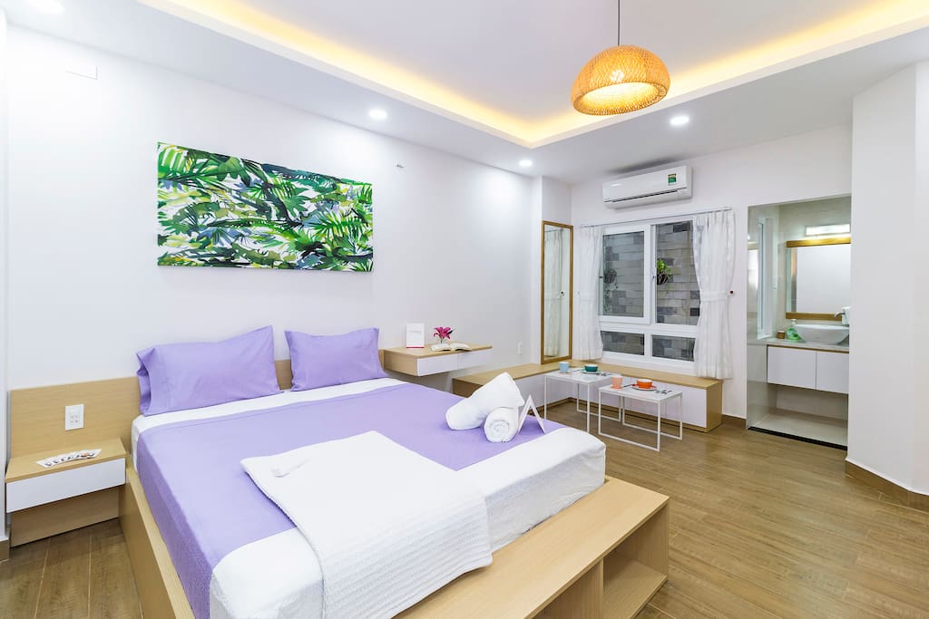 Queen-sized bed with Egyptian linens