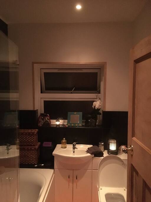 Small, shared bathroom and toilet but clean and modern.