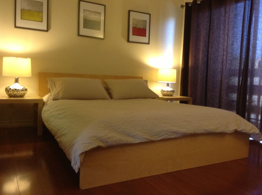 the comfy queen bed in the studio