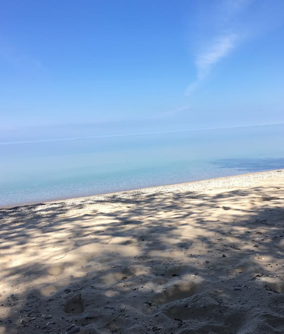 150 ft of private Lake Michigan sandy beachfront