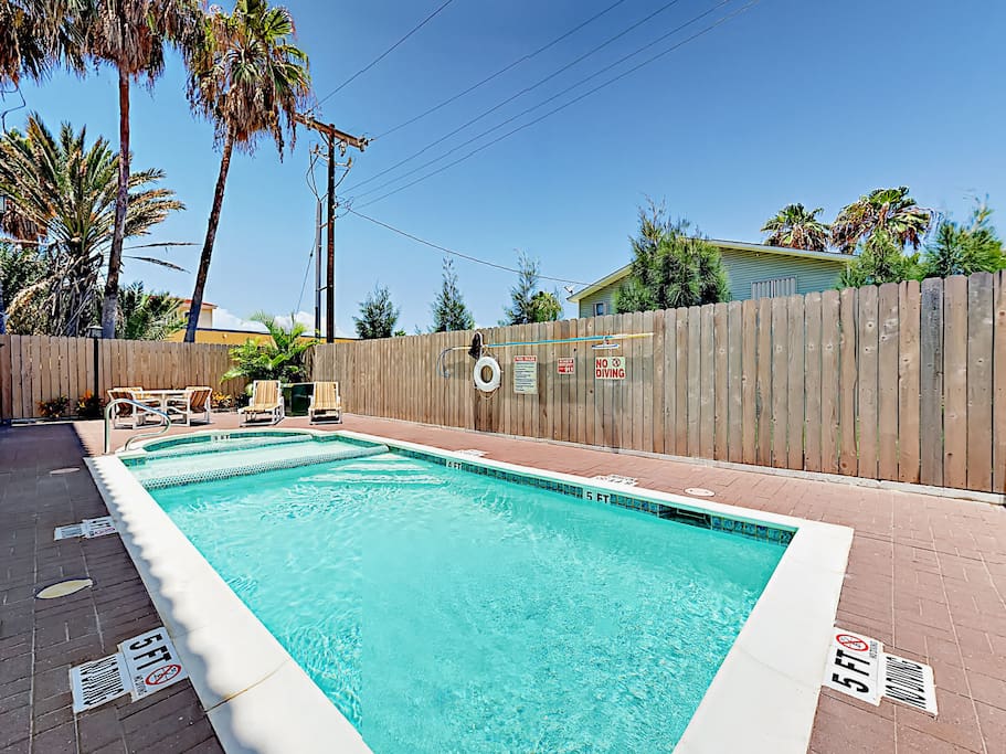 The complex pool also features a hot tub and kiddie pool