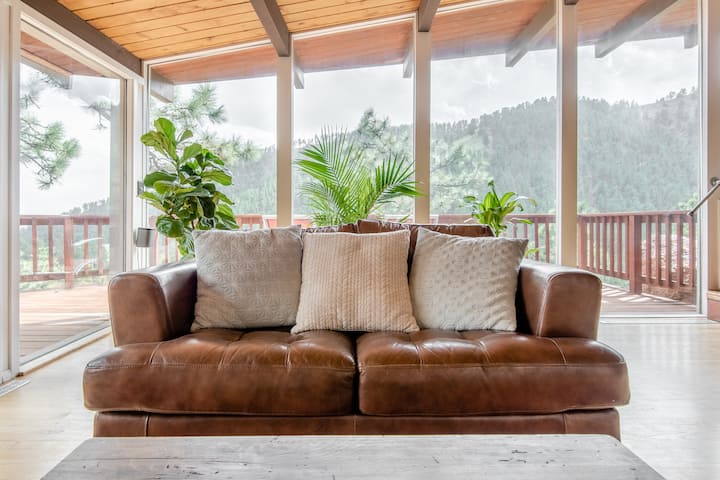 Admire Rocky Mountain Sunsets From a Cliffside Balcony