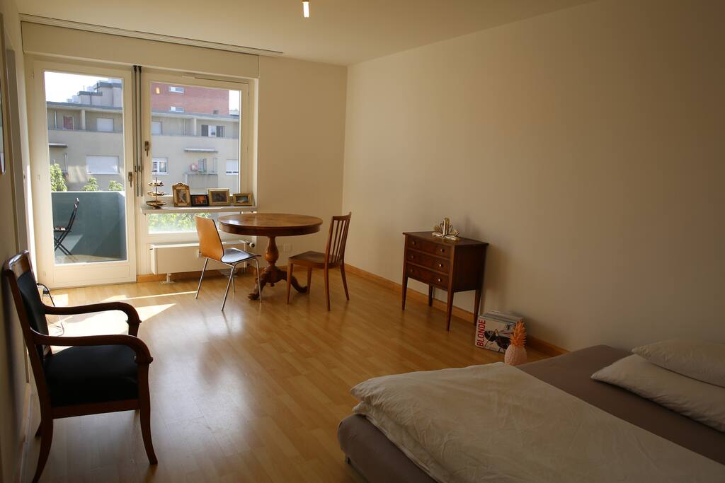 spacious bedroom with queensize