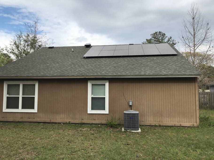 Back side of home with solar panels