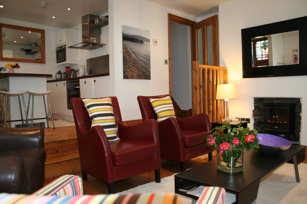 A modern lounge and kitchen with all the amenities