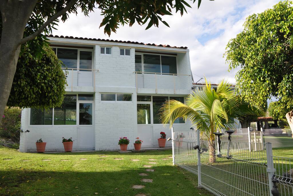 The property has three bungalows, two with three bedrooms, one with two bedrooms.