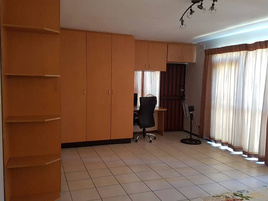 Cupboards and reading space in the bedroom