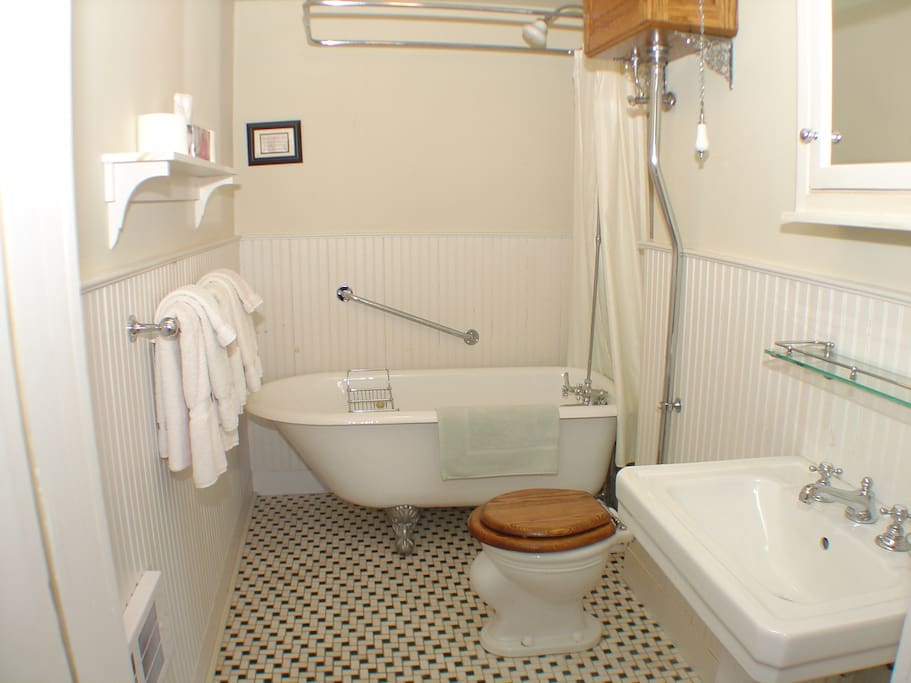 Private ensuite three-piece bath with marble floor. Enjoy a hot shower or a deep soak.