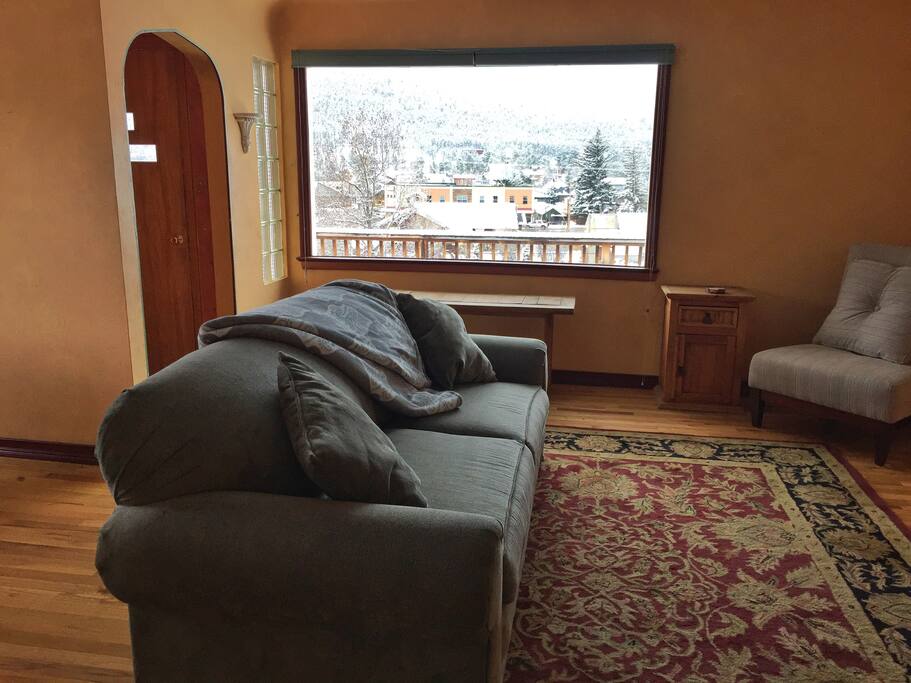 A comfortable and spacious open-floor plan can accommodate more guests on the queen-sized pull-out couch.