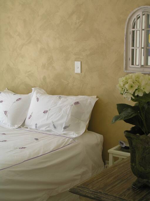 There is a headboard since this pic! Will replace photos asap!