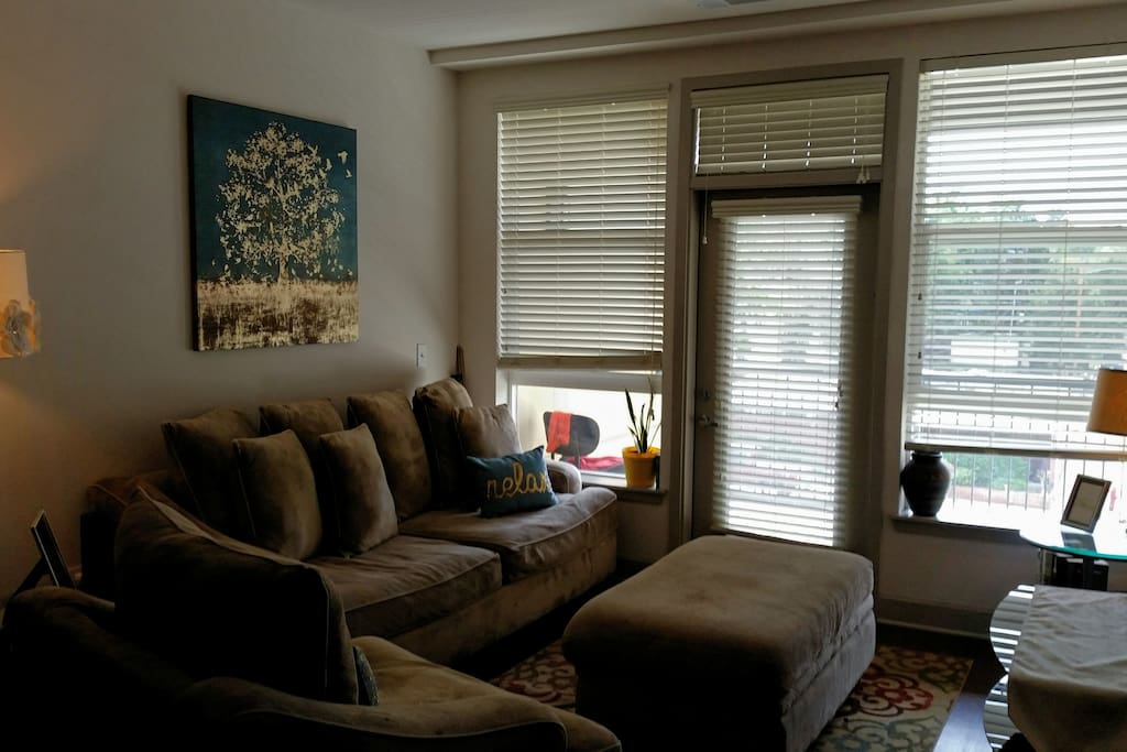 Full Sofa, Love Seat, Ottoman, Doorway to Balcony
