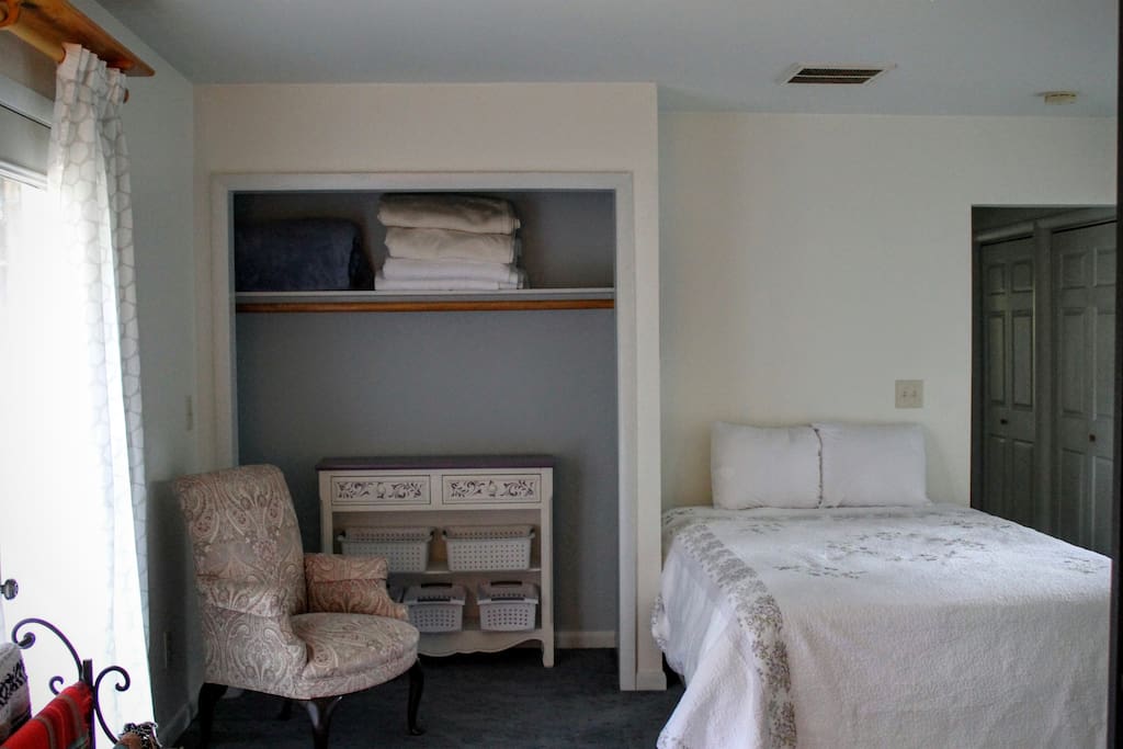 Comfortable Bed with Closet & Sitting Area