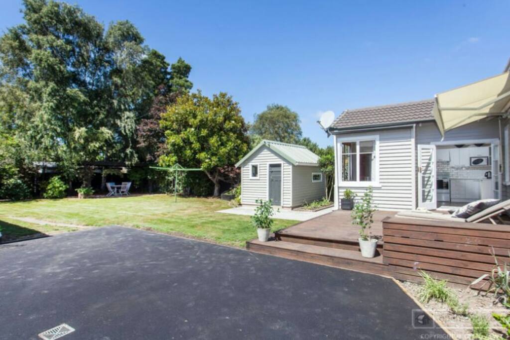 There is also a swing, trampoline, sand pit and play house.