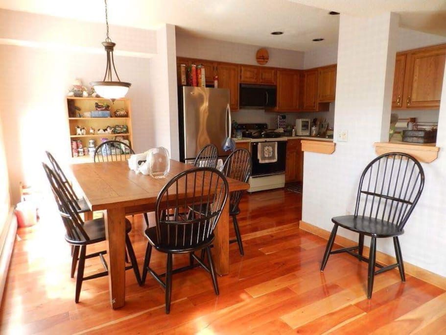 New Dining Room Table and chairs all solid wood floors on two floors and stairs new stainless steal appliances in Kitchen with K Cup