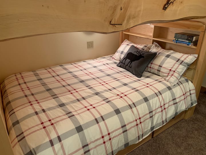 Each double bed has an individual bookcase and light