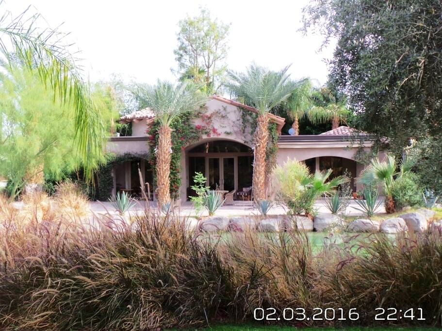 view of guest casita from main house across lake