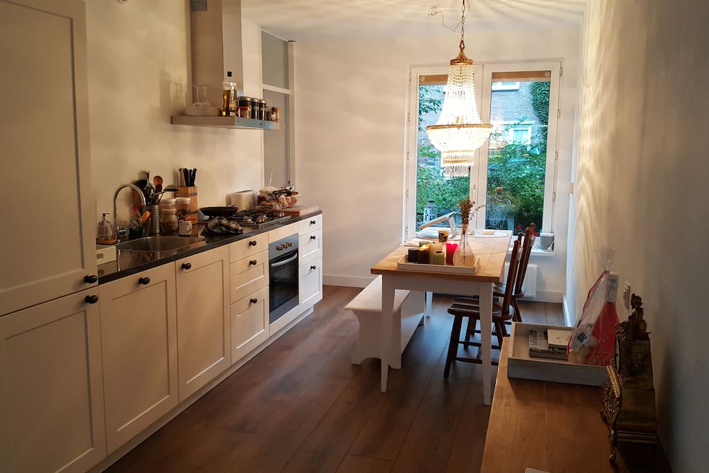 The Kitchen with an entrance to a small garden