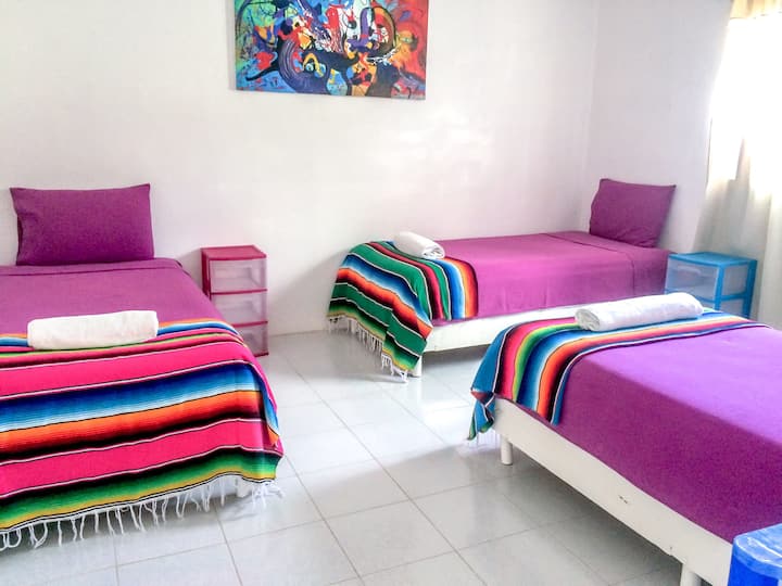 Dormitorio 2: 3 camas individuales.